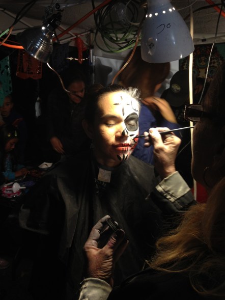 Getting my face put on.